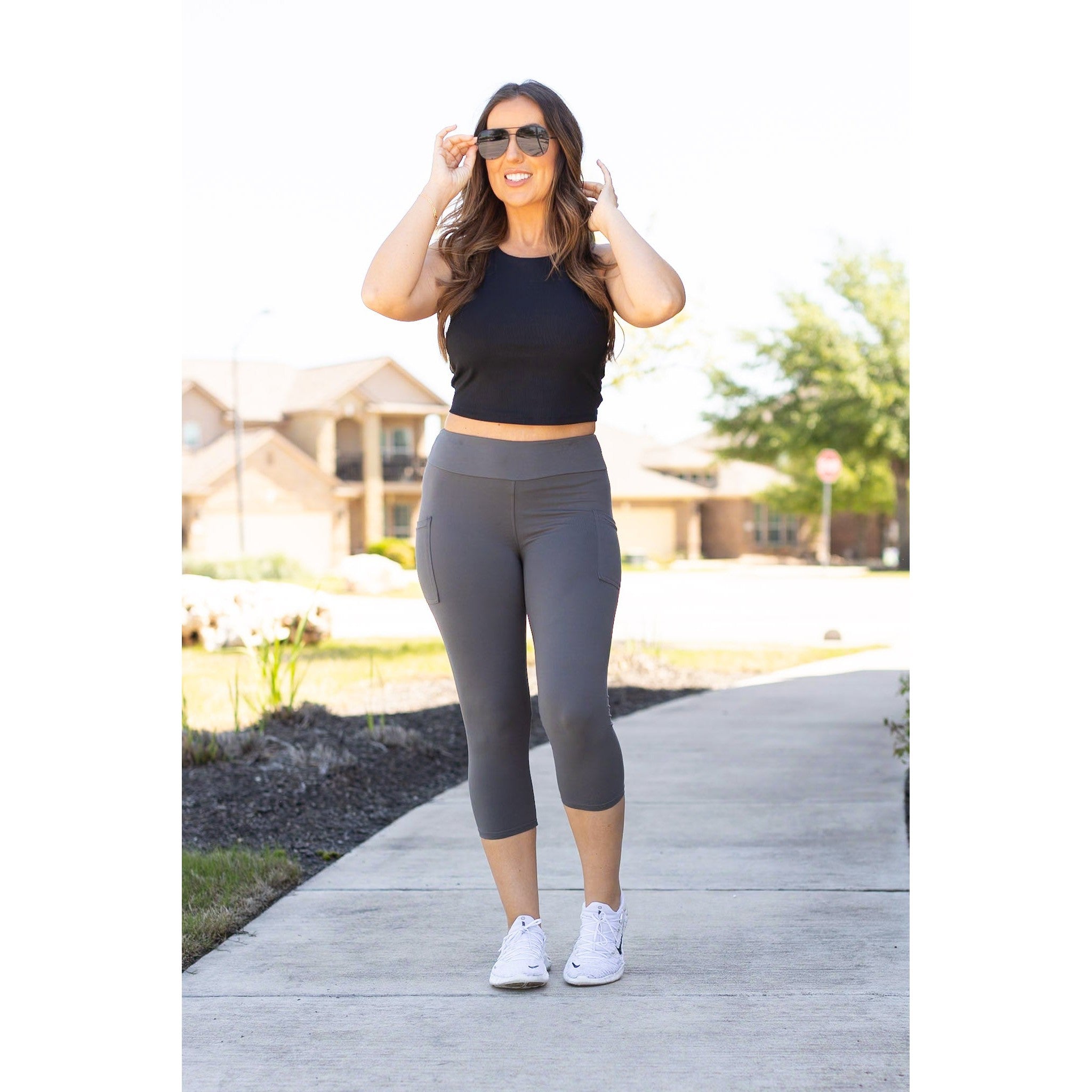 Julia Rose The Dani charcoal capri leggings with pockets, Women wearing charcoal capri pocket leggings