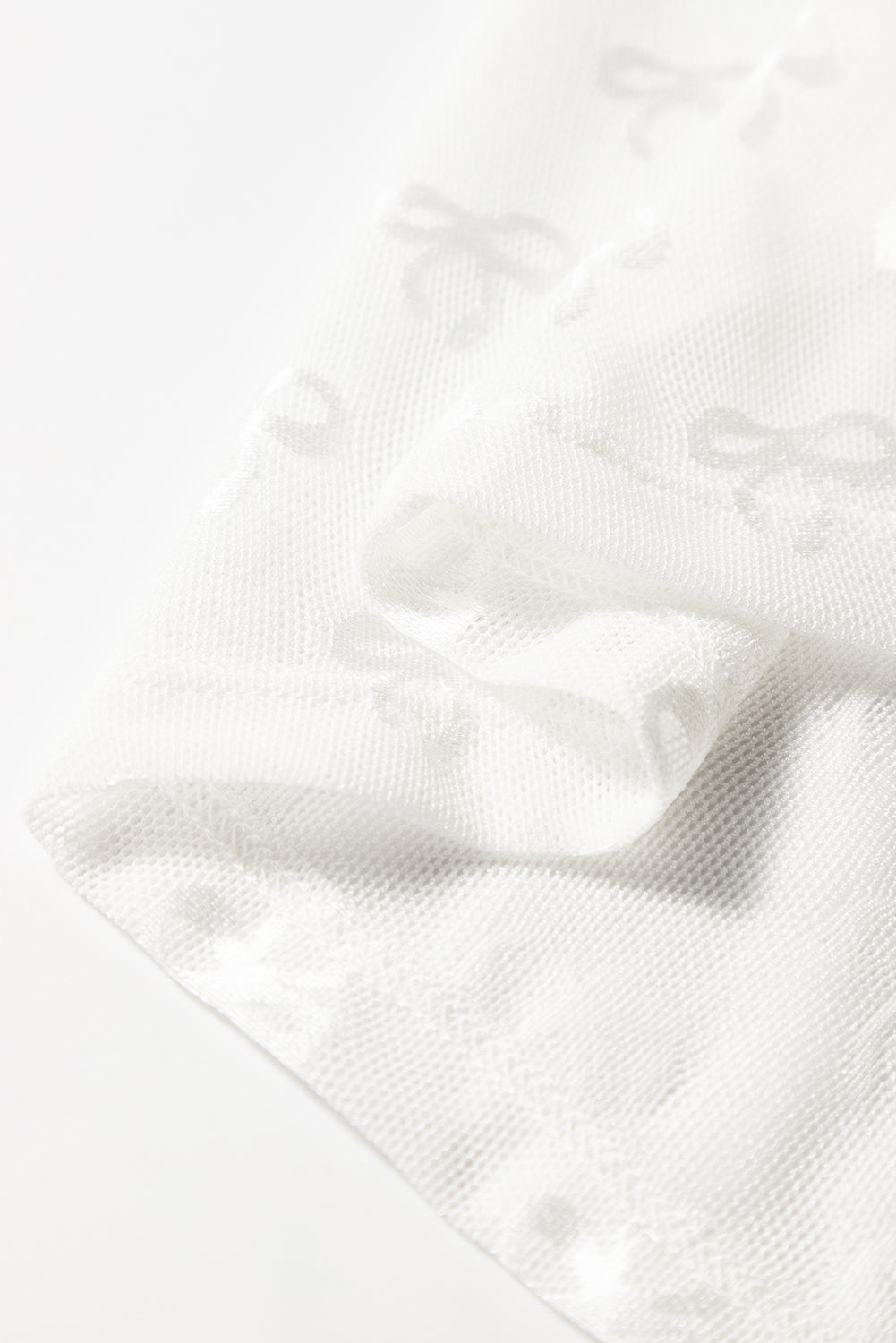 PRE-ORDER: Bow Pattern Long Sleeve Slim Fit Mesh Top