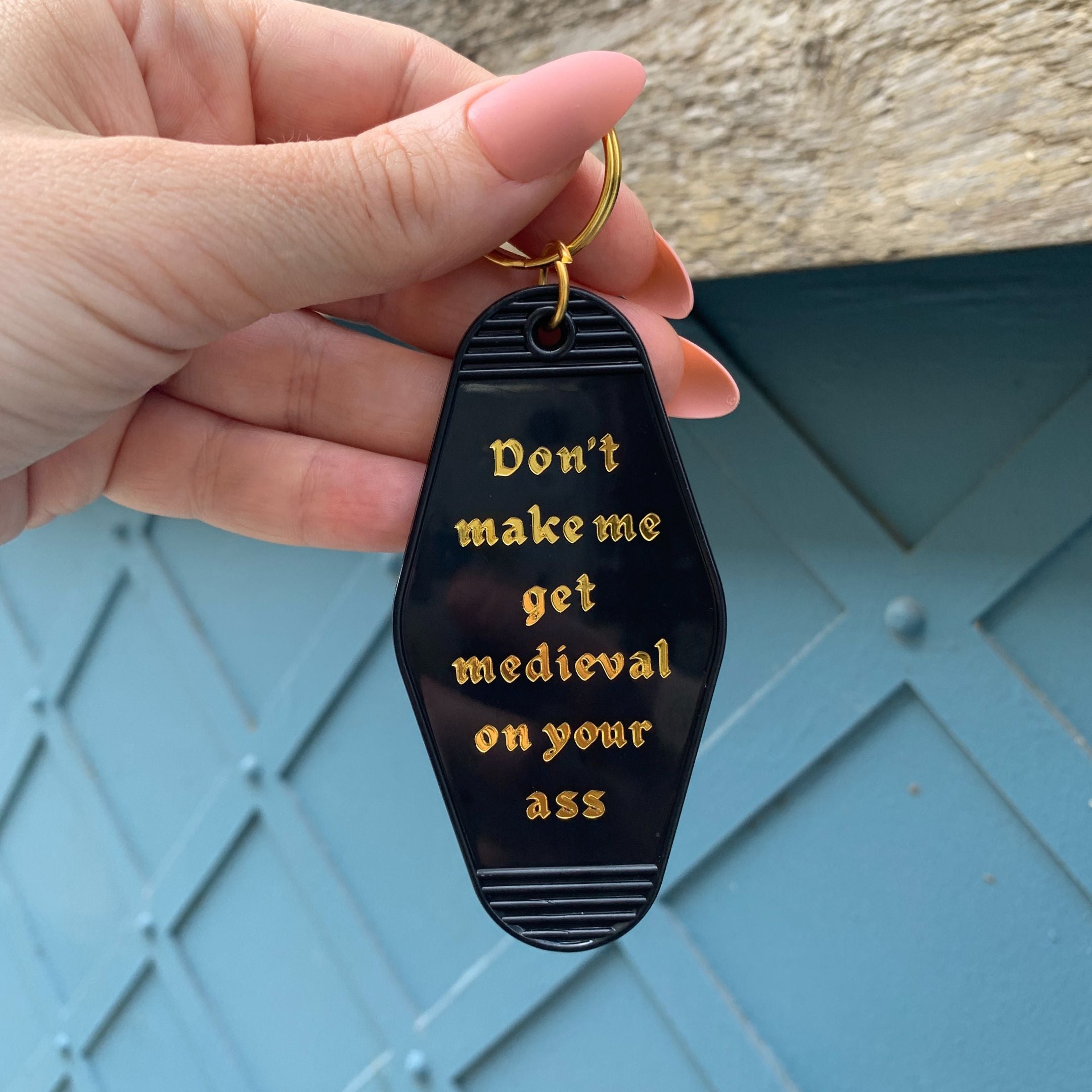 Don't Make Me Get Medieval on Your Ass Motel Style Keychain