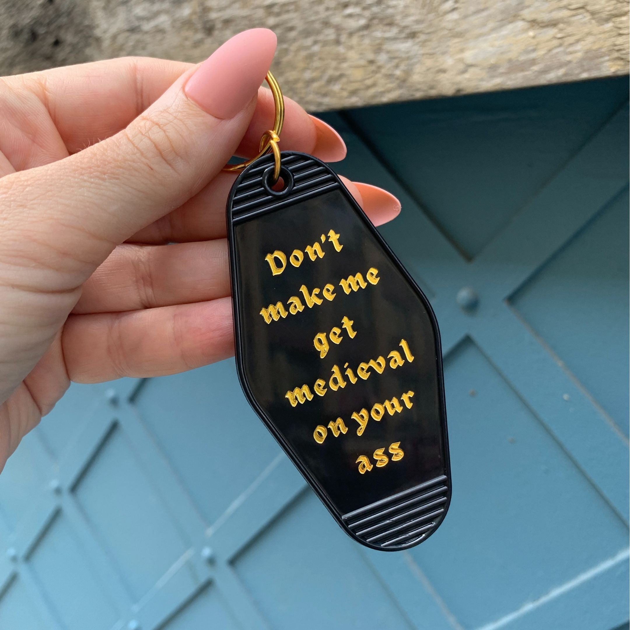 Don't Make Me Get Medieval on Your Ass Motel Style Keychain