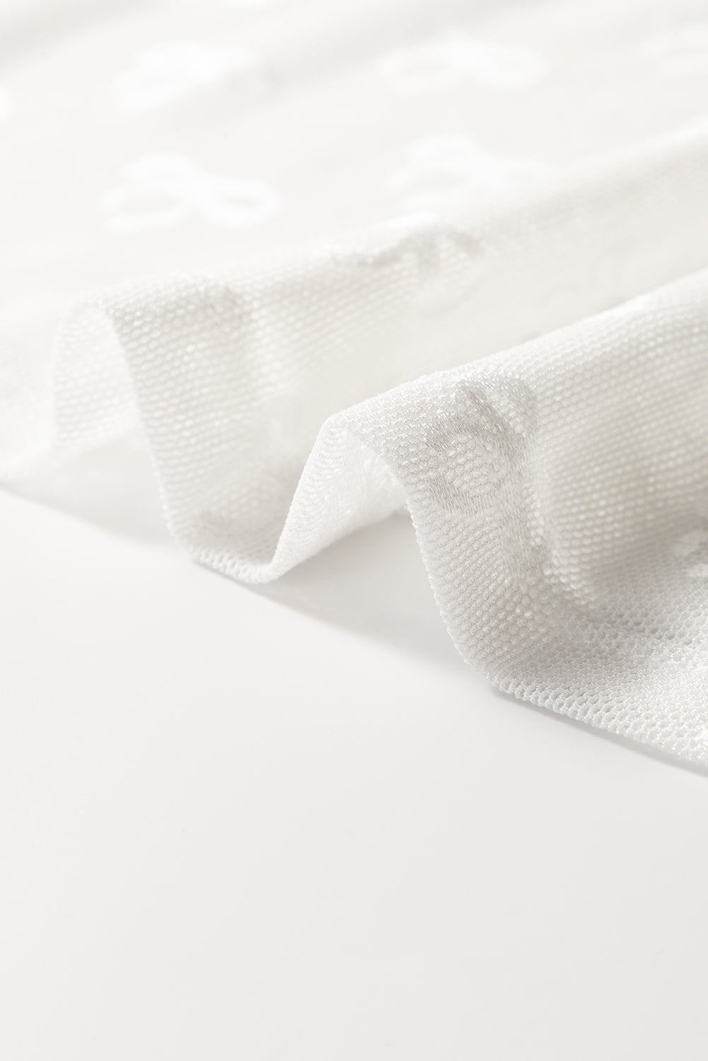 PRE-ORDER: Bow Pattern Long Sleeve Slim Fit Mesh Top