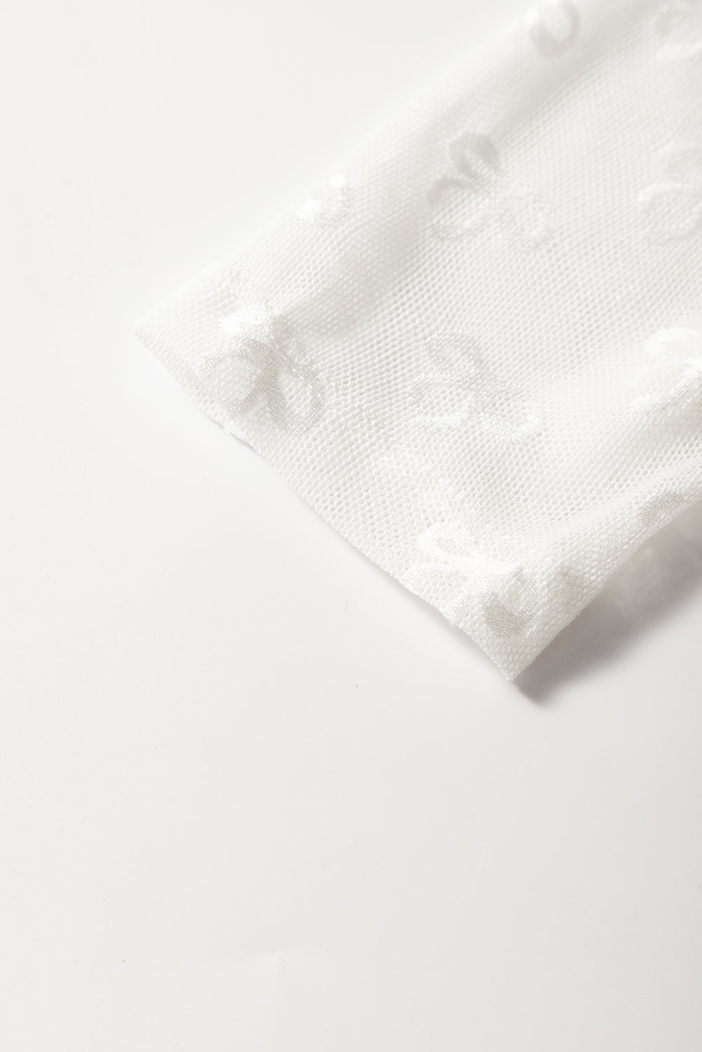 PRE-ORDER: Bow Pattern Long Sleeve Slim Fit Mesh Top