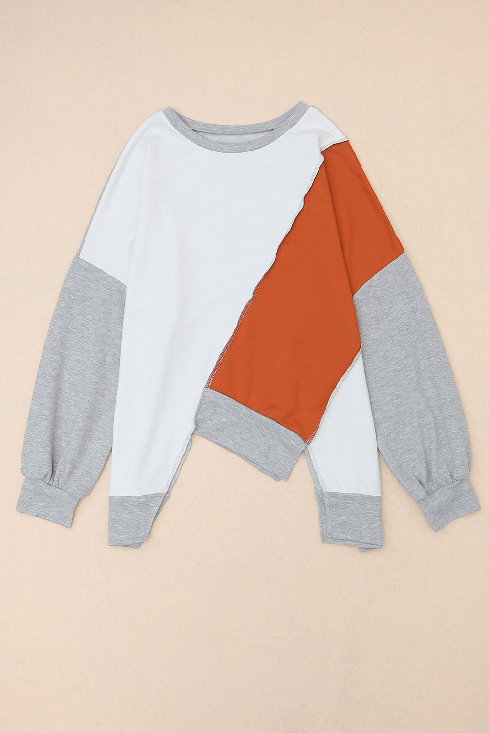 PRE-ORDER: Colorblock Stitching Irregular Hem Long Sleeve Top