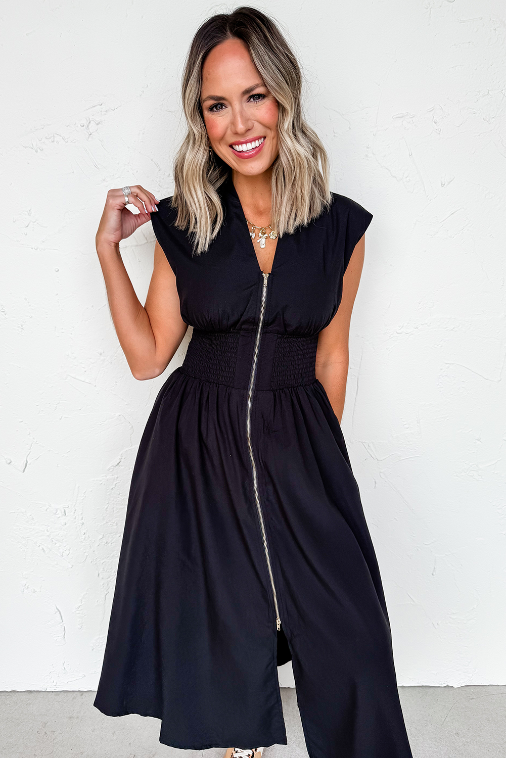 PRE-ORDER: Black Sleeveless Zipped Front V Neck Shirred Waist Midi Dress