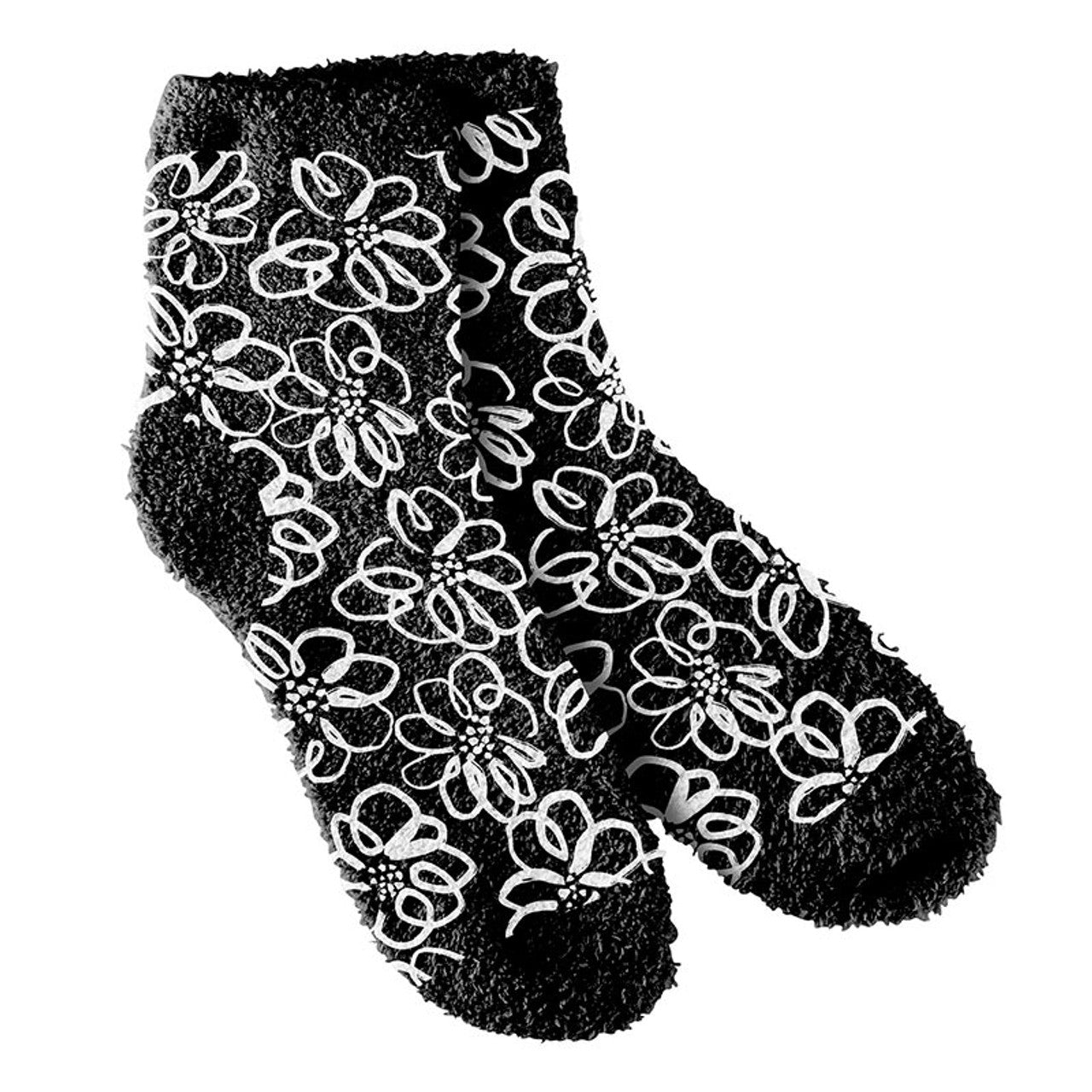 Black socks with white floral patterns on a white background