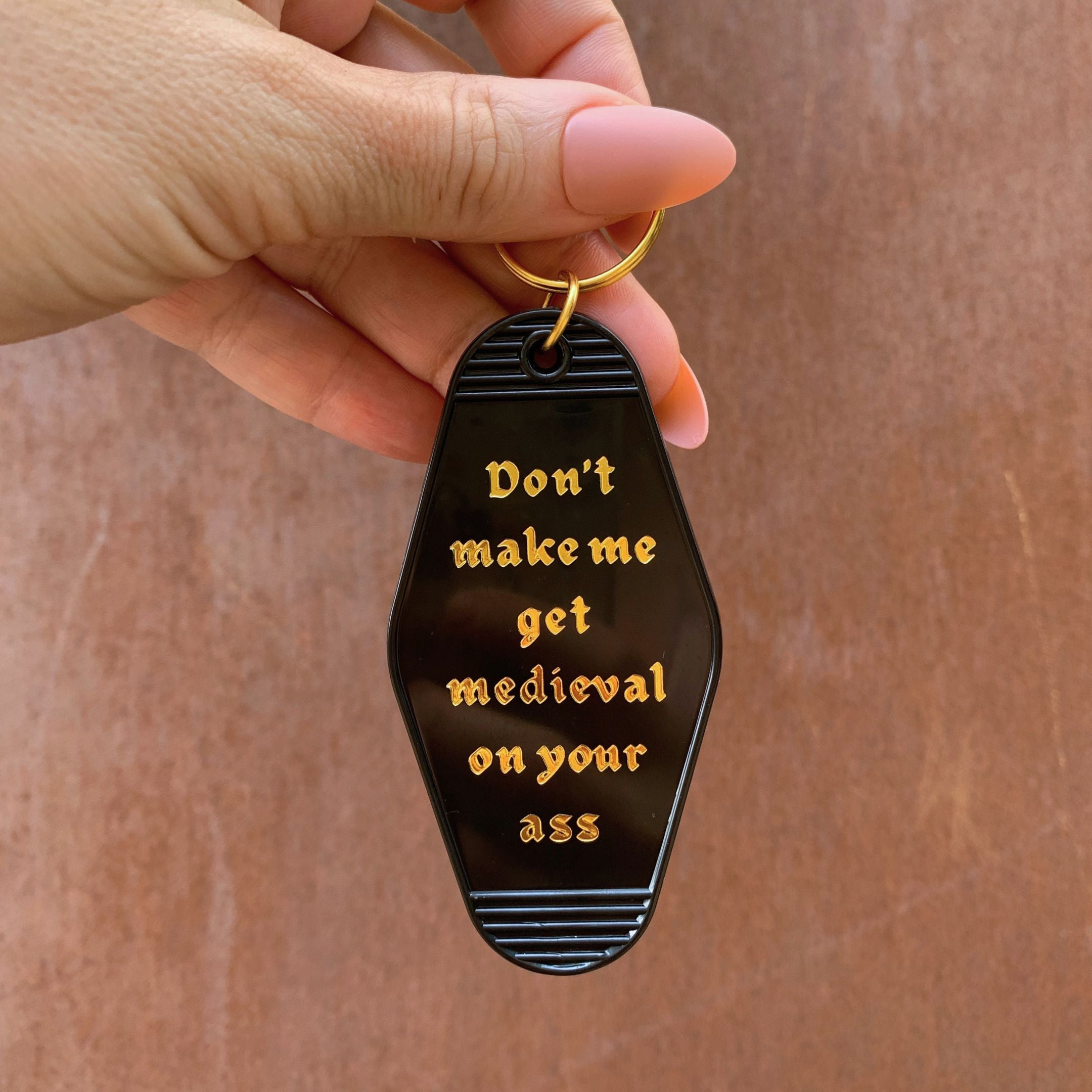 Don't Make Me Get Medieval on Your Ass Motel Style Keychain