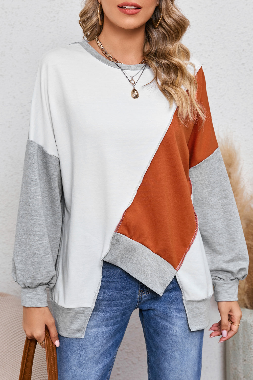 PRE-ORDER: Colorblock Stitching Irregular Hem Long Sleeve Top